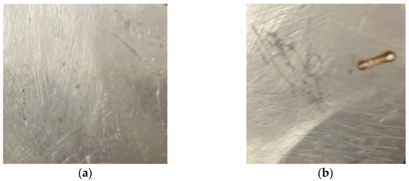 Silver target: (a) before irradiation; (b) after laser ablation during PLD processes.