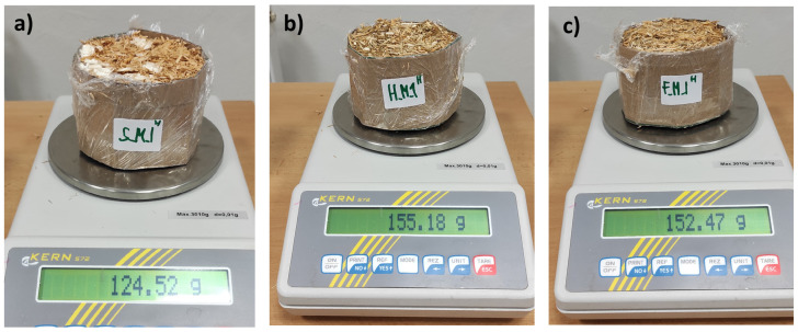 Representative samples of wheat-based (a), hemp-based (b) and flax-based (c) composites injected with mycelium during the process of forming and weighing samples before drying.