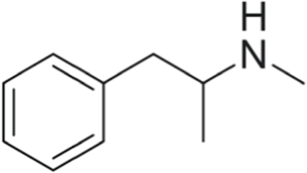 Chemical structure diagram showing a benzene ring attached to a three-carbon chain, ending with a dimethylamino group. This represents the molecular structure of methamphetamine. Black lines indicate chemical bonds and letters show specific atoms.