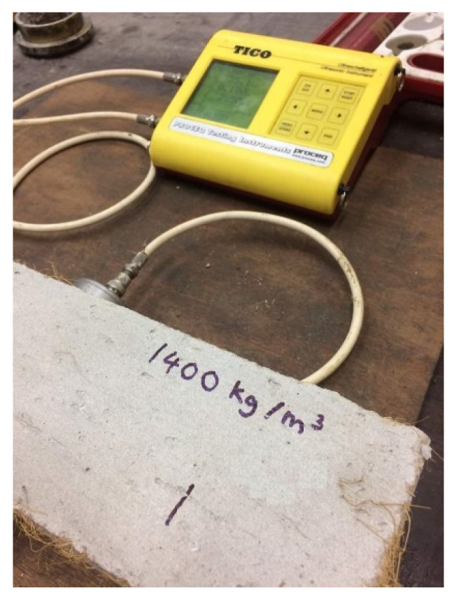 Ultrasonic pulse velocity test of LFC specimen.