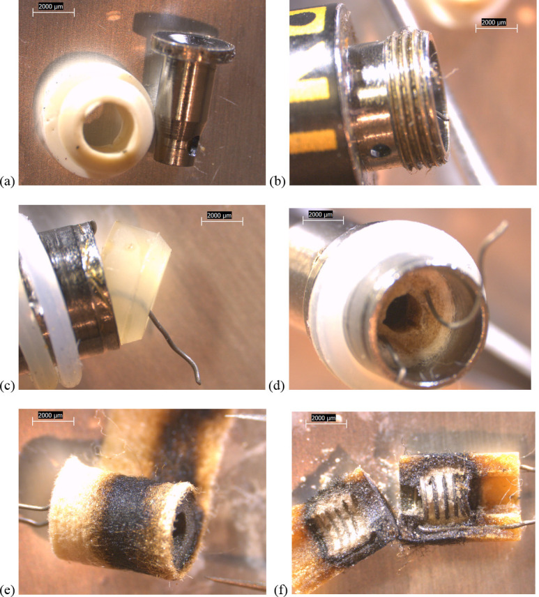 10x stereozoom microscope images of components from used TKO cartridge associated with EVALI case.a) battery contact and white polymer gasket b) filament wire leads exposed when battery contact removed c) polymer plug at end of tube. d) filament wire leads embedded in cylindrical ceramic, itself wrapped in fibrous wicking/insulation. e) charred material suggesting high temperatures on fibrous insulation and downstream end of ceramic. f) inside of oil-soaked ceramic showing embedded filament coils and no burn marks where there is no oil.